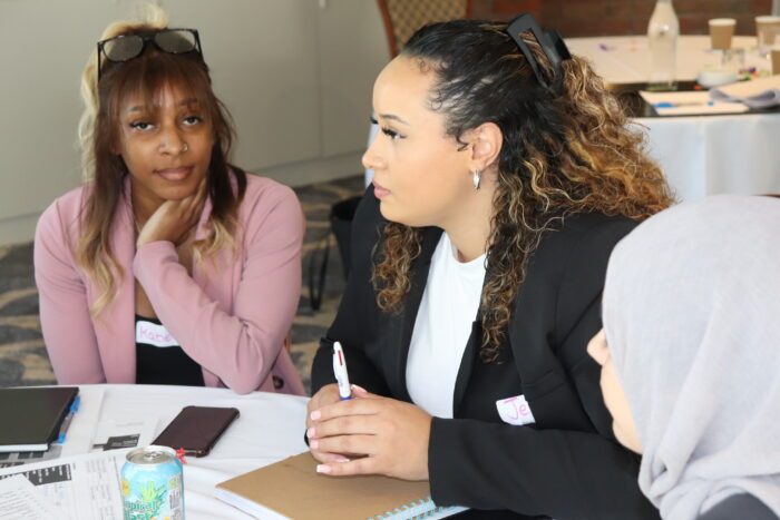 Compass Birmingham MHST staff induction at a table