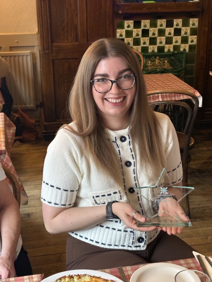 Elise with award